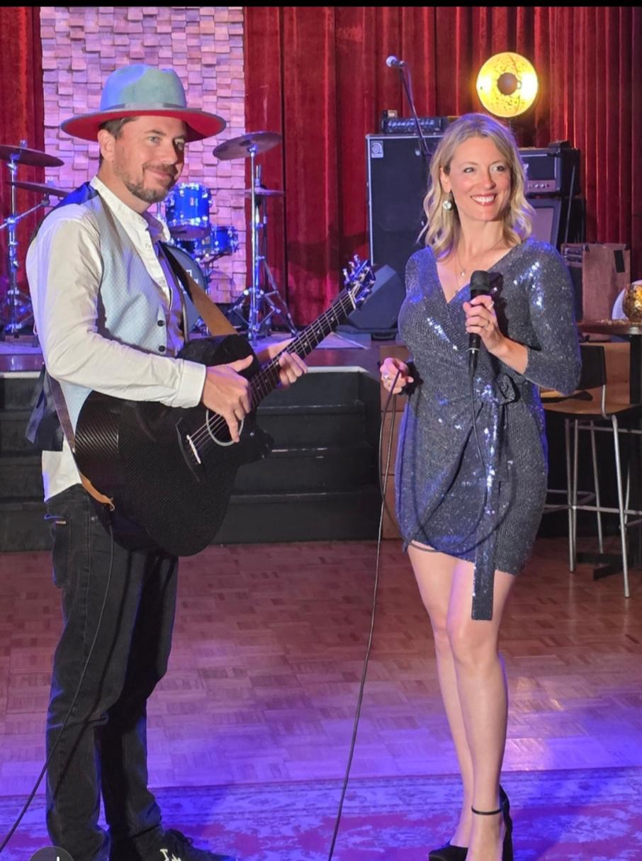 Velvet Union posing with guitar and microphone